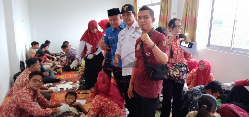 Dalam Rangka HUT Ke 66 Provinsi Riau, KNPI Rohil Bersama PPNI Gelar Sunatan Massal